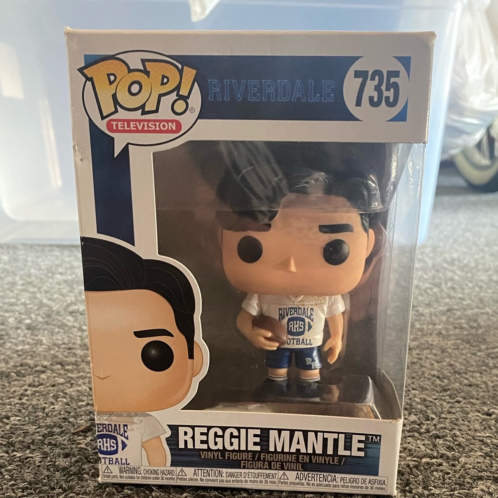 REGGIE MANTLE funky pop figure.  never unboxed. Little dent on side of box